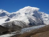 26 Shishapangma North Advanced Base Camp Next To Ice Pinnacles Of Shishapangma Glacier With Phola Gangchen And Shishapangma North Face Shishapangma North ABC at the lower left near the ice pinnacles of the Shishapangma Glacier, Phola Gangchen on the left and Shishapangma North Face partially in the clouds from the ridge (5790m) above Shishapangma North Advanced Base Camp.